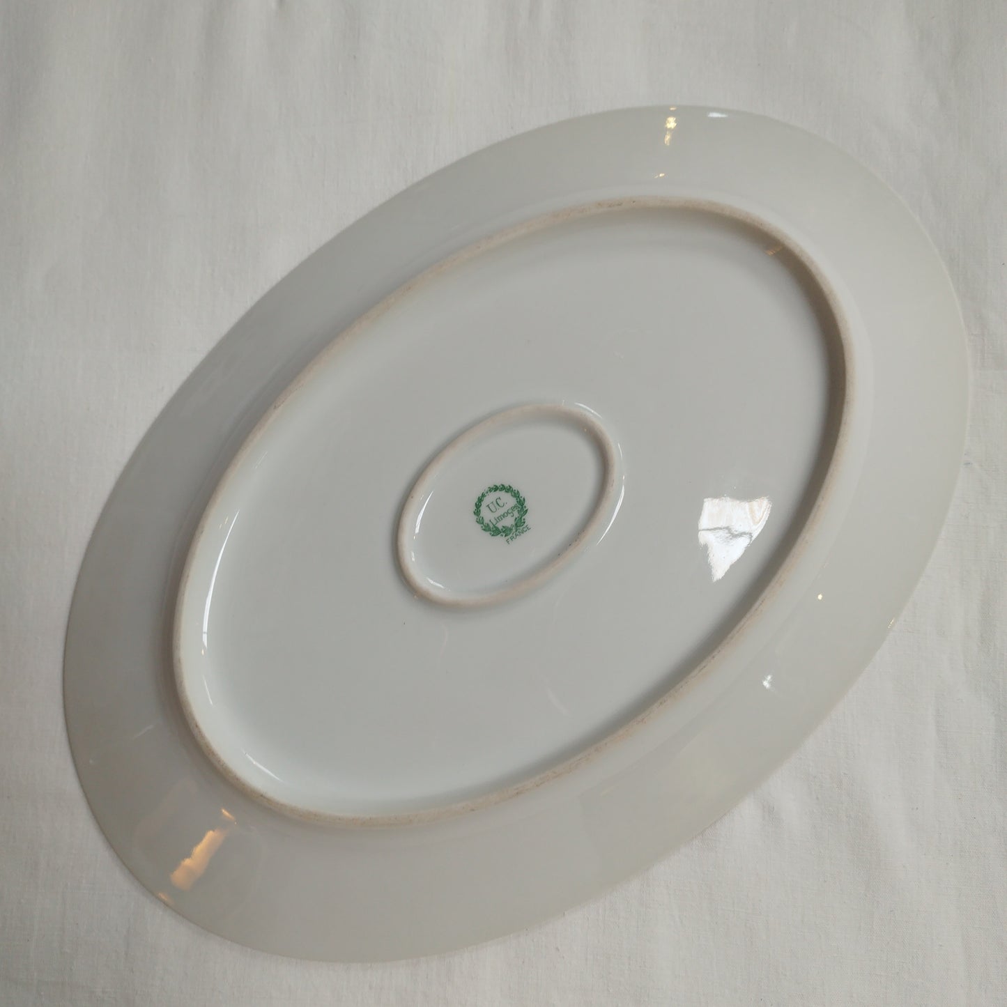 Plat ovale porcelaine de Limoges Ecaille